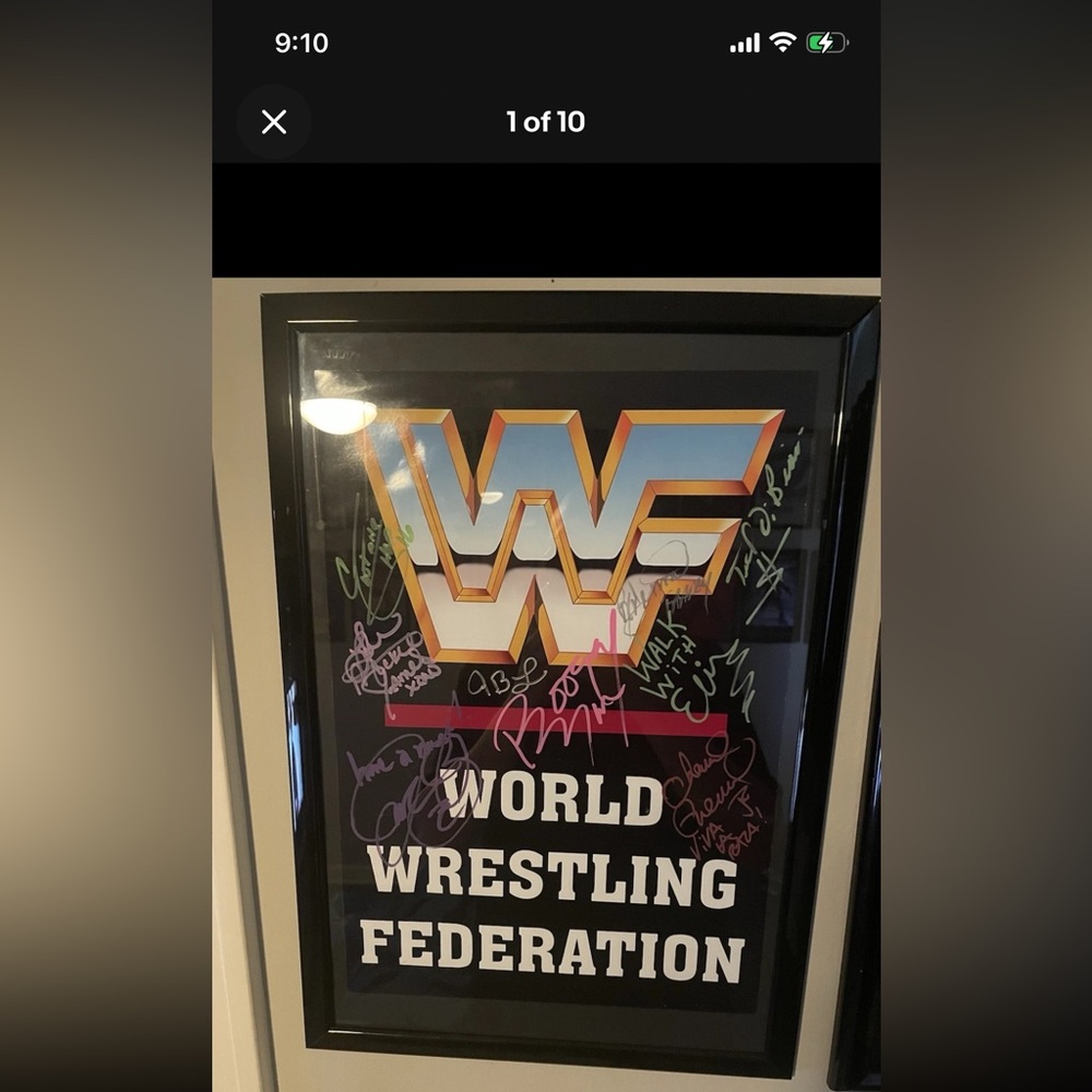 WWF/WWE AUTOGRAPHED POSTER
(16 LENGTH 11 WIDTH)
FRAME INCLUDED